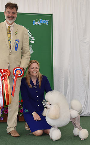 Miss M Harwood & Mrs L Cunningham Am Ch Clarion Counter Fire (Imp USA) with group judge Mr P Young